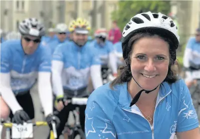  ??  ?? > Rhian Burke takes part in the Wickets and Wheels charity ride in memory of her husband and son