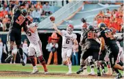  ??  ?? Baker Mayfield threw for 598 yards and five touchdowns against Oklahoma State. That not only led Oklahoma to a Bedlam victory but also had to impress the nearly two dozen NFL scouts who attended the game.