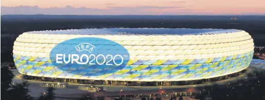  ??  ?? Bayern Munich’s home Allianz Arena, a venue for the Euro 2020, displays the event’s logo in this undated photo, Munich, Germany.