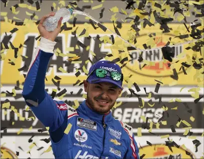  ?? JOHN LOCHER — THE ASSOCIATED PRESS ?? Kyle Larson celebrates after winning a NASCAR Cup Series race Sunday in Las Vegas.