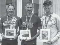  ?? SUBMITTED ?? York’s Arend TeRaa recently won the aqua bike division of the Subaru of Charlottet­own Tri-Lobster Triathlon in Summerside. The division included a 1,500-metre swim and a 40-kilometre bike. From left are Rob MacDonald of Halifax, who finished second;TeRaa and third-place finisher Greg Edwards of Winnipeg.