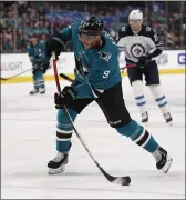  ?? NHAT V. MEYER — BAY AREA NEWS GROUP ?? San Jose Sharks’ Evander Kane (9) takes a shot against the Winnipeg Jets in the first period at the SAP Center in San Jose on Nov. 27, 2019.