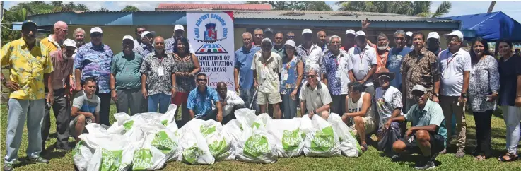  ?? Photo: Waisea Nasokia ?? Members of the Associatio­n of Ex-Civil Aviation Staff after the clean-up campaign at Wailoaloa Beach in Nadi on October 7, 2018.