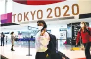  ?? AP PHOTO/KIICHIRO SATO ?? Simone Biles and her U.S. women’s gymnastics teammates arrive for the Tokyo Olympics this past Thursday at Narita Internatio­nal Airport. The opening ceremony is Friday.