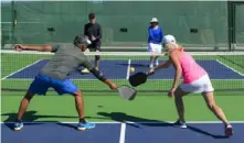  ?? Shuttersto­ck ?? Pickleball is fairly safe, but for older players, muscle sprains and strains from on-court slips and falls are common hazards.