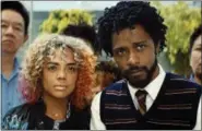  ?? ANNAPURNA PICTURES VIA ASSOCIATED PRESS ?? This photo released by Annapurna Pictures shows Tessa Thompson, left, and Lakeith Stanfield in a scene from the film “Sorry To Bother You.”