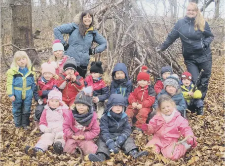  ?? ?? Staff and pupils at Wingate Community Nursery School enjoy the great outdoors.