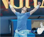  ?? Daniel Pockett/Getty Images ?? J.J. Wolf celebrates match point after defeating Michael Mmoh in the third round at the Australian Open at Melbourne Park on Saturday.