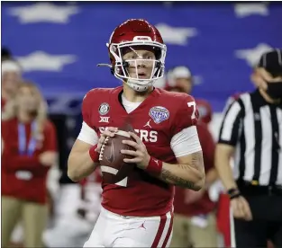  ?? MICHAEL AINSWORTH — THE ASSOCIATED PRESS ?? Oklahoma quarterbac­k Spencer Rattler drops back to pass during the Cotton Bowl. Rattler could be a potential second or third day pick for the Eagles.