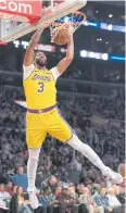  ?? AP ?? Lakers forward Anthony Davis dunks during the second half.