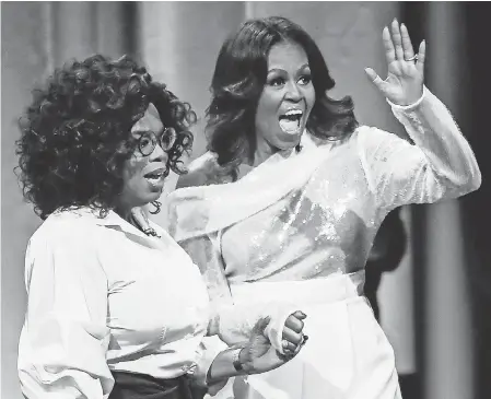  ?? TANNEN MAURY/EPA-EFE ?? Former first lady Michelle Obama is promoting her memoir “Becoming.” She had a book launch with Oprah Winfrey on Tuesday in Chicago.