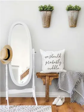  ??  ?? (right) Ana uses this mirror to try on outfits. The bench is rustic yet practical as it’s the perfect place to put on shoes. Potted plants on the wall are a nod to Joanna Gaines. “When I bought them, I was all about the ‘Joanna Gaines hanging plants on the wall’ trend,” Ana says. “I still love them!”