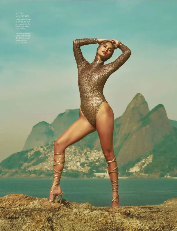  ??  ?? MOVING MOUNTAINS Posing and shooting on a rocky cliff isn’t an easy task, but the Queen sure made it look effortless
Embellishe­d bodysuit with hood by NERIC BELTRAN, Metallic strappy heels by JEFFERSON SI