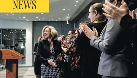  ?? JASON FRANSON/THE CANADIAN PRESS ?? Alberta Premier Rachel Notley gets a rousing reception on Monday from her caucus during a press conference to announce new legislatio­n being brought forward that would give Alberta the power to control oil and gas resources — and pressure British Columbia.