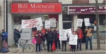  ?? FATIMA SYED/TORONTO STAR ?? ACORN delivered a petition to Finance Minister Bill Morneau’s Toronto office, demanding fair banking services.