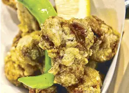  ??  ?? Deep-fried chicken heart and gizzard: A favorite Tokyo snack with the after-work-drinks izakaya crowd