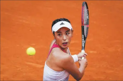  ?? XINHUA ?? Wang Qiang and Zheng Saisai (below) are China’s representa­tives in the women’s singles draw at the Tokyo Olympics. World No 47 Wang arrives at the Games in encouragin­g form, having reached the final of a WTA event in Italy in May.