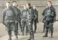  ?? EONE FILMS. ?? Wes Chatham, left, Liam Hemsworth, Michelle Forbes, Josh Hutcherson, Jennifer Lawrence, Natalie Dormer, Omid Abtahi and Sam Claflin star in the fourth edition of The Hunger Games.