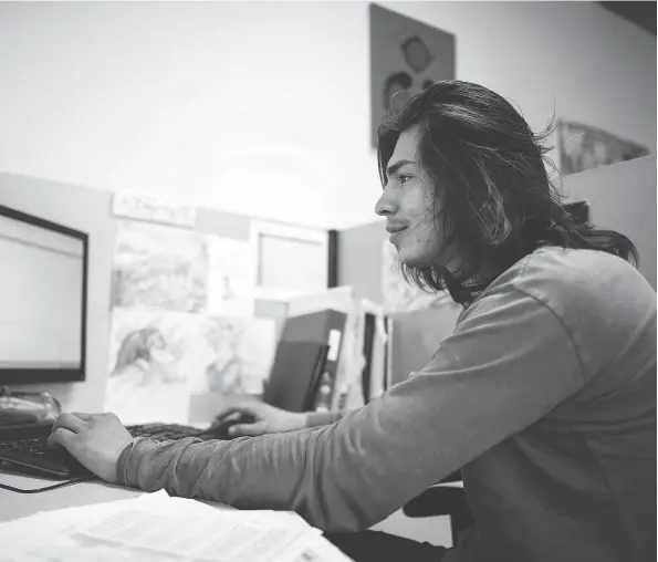  ?? QC PHOTO BY BRANDON HARDER ?? Timothy Poitras-kay works on a computer learning to use the program Microsoft Access at the Ignite Adult Learning Corporatio­n on Winnipeg Street.