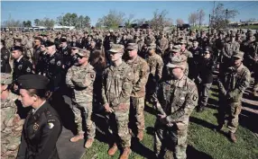  ?? DENNY SIMMONS / THE TENNESSEAN ?? Soldiers attend a memorial Thursday for nine soldiers with the U.S. Army’s 101st Airborne Division who died in a training mission March 29, 2023.