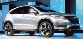  ?? Daniel Acker Bloomberg ?? HONDA unveils its “urban SUV concept” vehicle, a small crossover priced below the automaker’s successful CR-V sport utility, at the Detroit auto show Monday.