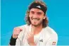  ?? AFP ?? Stefanos Tsitsipas celebrates after victory against Jannik Sinner during their match at the Australian Open.