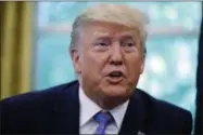  ?? CAROLYN KASTER ?? President Donald Trump talks during a signing ceremony in the Oval Office of the White House in Washington, Monday, July 1, 2019, with Vice President Mike Pence, left, and Secretary of Health and Human Services Alex Azar. The president signed a $4.6 billion aid package to help the federal government cope with the surge of Central American immigrants at the U.S.-Mexico border.