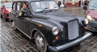  ?? ?? For-hire hero: Roman Tymchyshyn in London taxi he drove from Surrey