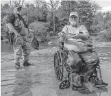  ?? [PROVIDED/ OKLAHOMA WILDLIFE CONSERVATI­ON DEPARTMENT] ?? Anglers fish for trout in the Blue River.