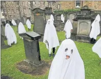  ??  ?? GHOST CHOIR: It Folds was performed in Greyfriars Kirkyard.