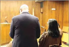  ?? MELANIE NGUYEN / THE CALIFORNIA­N ?? Riddhi Patel stands with Deputy Public Defender Jacob Evans at her hearing Tuesday. Her bail was reduced and terms of pretrial supervisio­n were set.