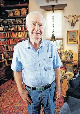  ?? LUIS SANCHEZ SATURNO / SANTA FE NEW MEXICAN VIA AP ?? Forrest Fenn, at his Santa Fe, N.M., home. The author and antiquitie­s dealer has inspired thousands to search remote areas of the west for treasure.