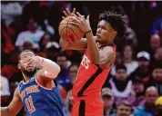  ?? Carmen Mandato/Getty Images ?? Helping the Rockets hold their own against the NBA’s best rebounding team was Amen Thompson, who grabbed 13 rebounds in the victory over the Knicks.