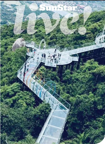  ??  ?? GLASS SKYWALK. The 400-meter-long Seaview Glass Skywalk at the Yalong Bay Tropical Paradise Forest Park in Sanya.