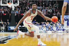  ?? KEVIN C. COX/GETTY IMAGES ?? Arizona centre Deandre Ayton is arguably the best choice as the player the Phoenix Suns should build around.