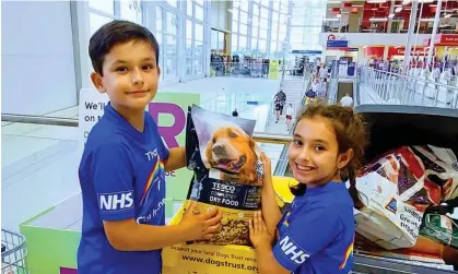  ?? Mark Evans-Guillen/PA ?? Twins Ruben and Elena Evans-Guillen, 11, have received BEMs after raising £50,000 for the NHS over the past three years. Photograph: