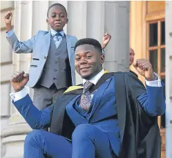  ?? Pictures: Kim Cessford. ?? Tanatswa Jamera celebrates with his young nephew, Tafara Jamera, outside the Caird Hall.