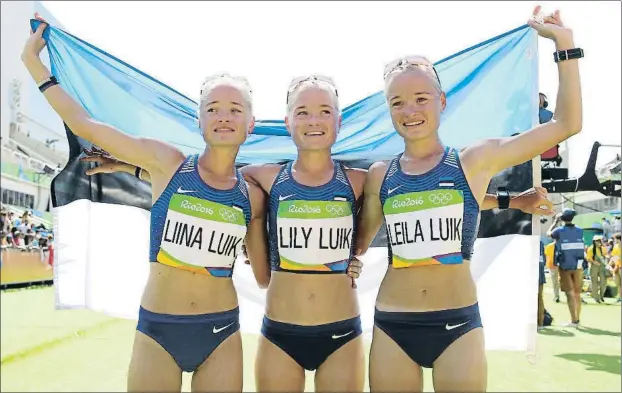  ?? BUDA MENDES / GETTY ?? La foto, poc després de la marató de Rio de Janeiro, ho diu tot: són idèntiques; i una altra curiositat: les seves millors marques coincideix­en amb l’ordre de naixement: la gran, la Leila, té el millor registre, i la petita, la Lily, el pitjor