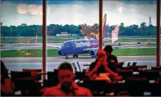  ?? SMILEY N. POOL/TNS ?? Southwest Airlines is facing higher costs as a result of higher labor rates and airport costs, stepped-up hiring, employee incentives for coronaviru­s vaccinatio­ns and lower productivi­ty.