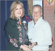  ??  ?? Mary Hardin Thornton (left) receives the William Fricks Award for a lifetime of service to downtown from DDA Chair Bob Blumberg.