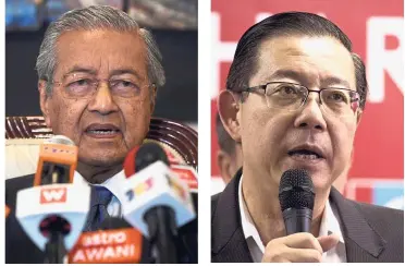  ??  ?? Top leaders: Prime Minister Dr Mahathir (left) and Finance Minister-designate Lim.