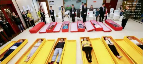  ?? ?? A college course holds a simulated funeral to help students better understand life and death