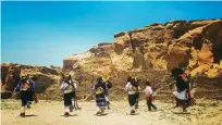  ??  ?? Acoma dancers at Chaco Canyon National Monument during a solstice ceremony.