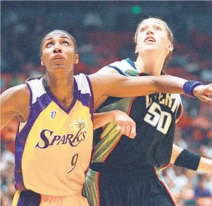  ?? AP ?? In a flashback, Los Angeles Sparks’ Lisa Leslie boxes out Liberty’s Rebecca Lobo in WNBA’s first game ever, 24 years ago today. Teams get together again Sunday in Los Angeles, with Liberty again coming out on top.