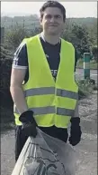  ??  ?? BALLYFASKI­N CLEAN UP: Tommy O’Dwyer joining in Galtee Gaels’ participat­ion in the Great Limerick Clean Up around his local area on Good Friday.