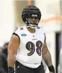  ?? GAIL BURTON/AP ?? Ravens defensive tackle Travis Jones, shown during minicamp, is expected to be able to collapse the pocket.“At the very minimum, he’s going to be able to knock guys back into the quarterbac­k, which you love,” director of player personnel Joe Hortiz said.