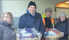  ?? (Pic: John Ahern) ?? WELL DONE LADS: Araglin Pony Club raffle winners, John O’Donovan (Gortnaskeh­y) and Edmond O’Donoghue (Ballinmado­ck), receiving their prizes from Mary Leddy (left) and Paula O’Donovan at last Saturday’s Kilworth & Araglin Point-to-Points.