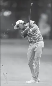  ?? ASSOCIATED PRESS ?? RICKIE FOWLER hits from the 13th fairway during the third round of the Rocket Mortgage Classic golf tournament, Saturday in Detroit.