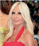  ?? GETTY IMAGES ?? Donatella Versace says she found her trademark hairstyle ‘‘when I was 11’’.