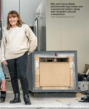  ?? ANDY MACDONALD/STUFF ?? Billy and Tracey Walsh, pictured with dog Comet, own a kennel and cattery, along with Taranaki’s only pet crematoriu­m.